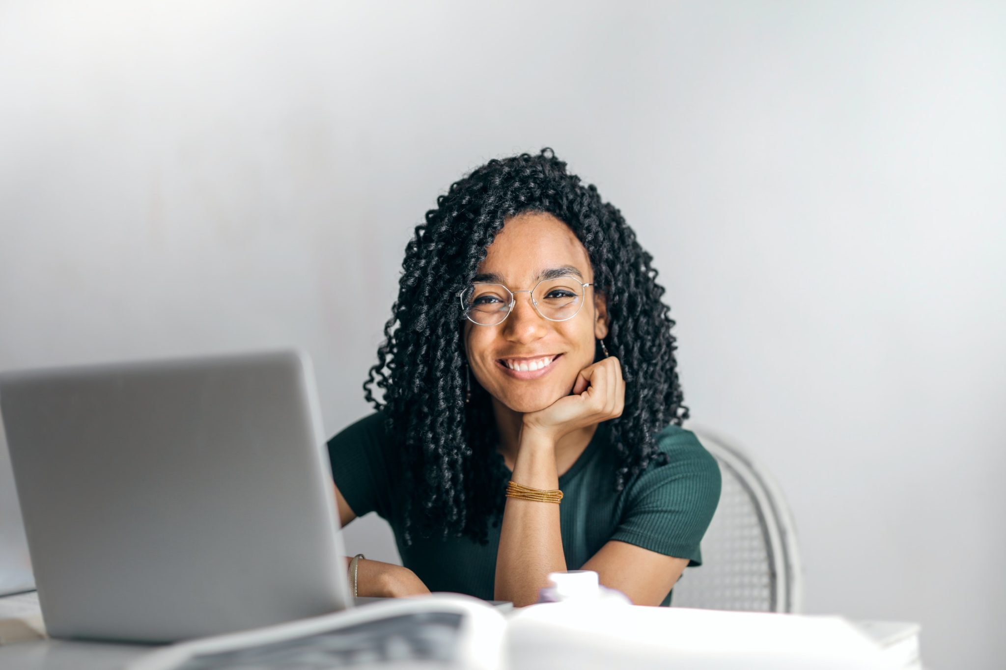 a woman sitting at a desk